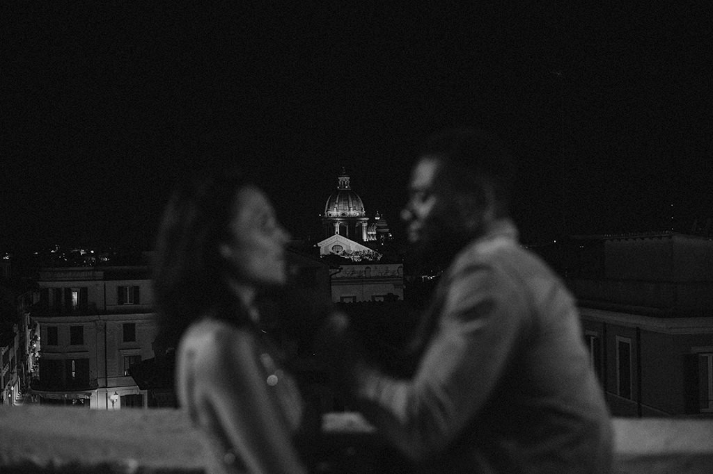 Rome view from Trinità dei Monti, interacial couple blurred in the frame