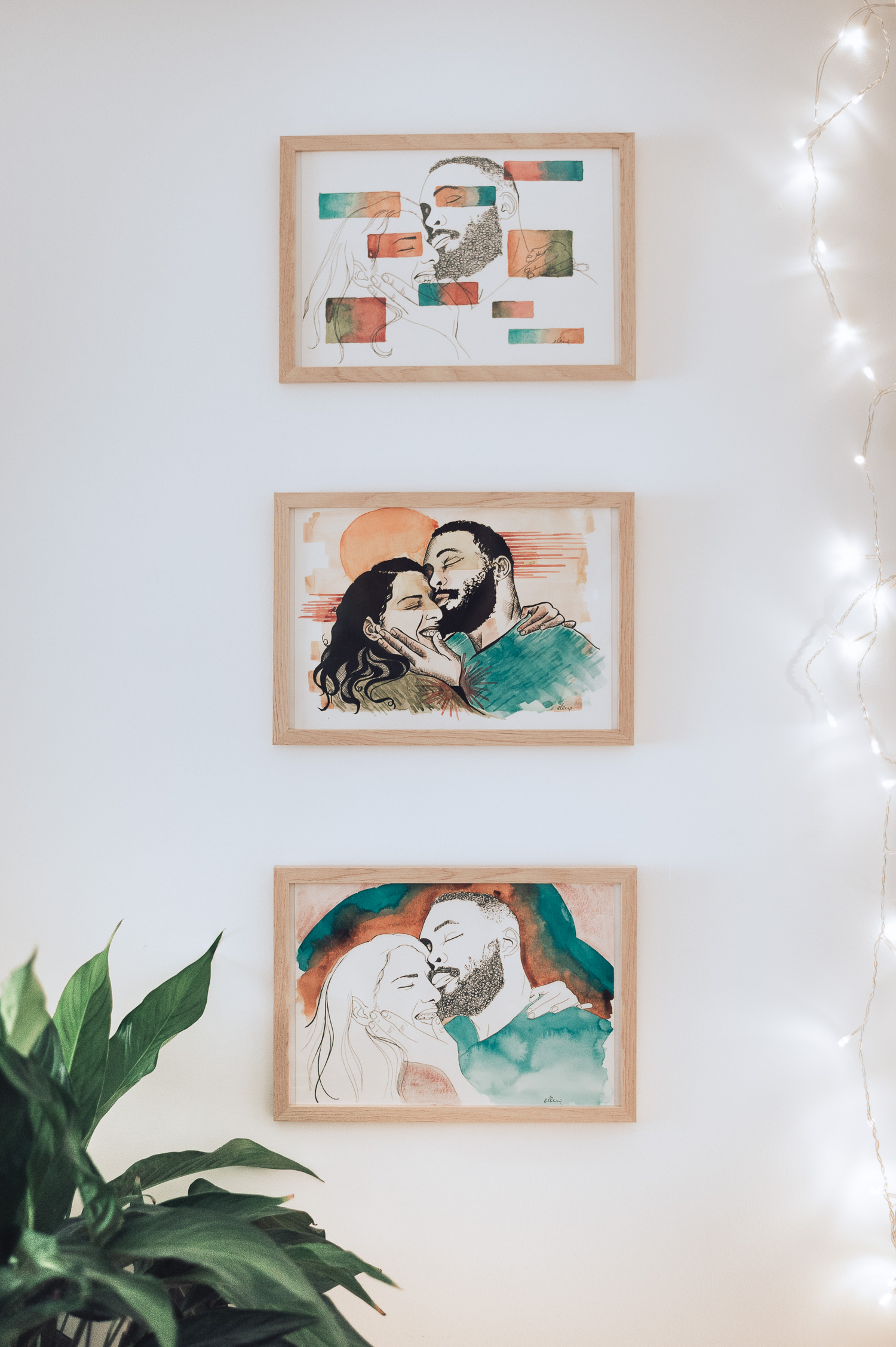 three paintings hanging on the wall - gift wedding photographer brussels